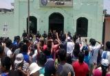 Los trabajadores de la empresa Tumán exigen la liberación de una compañera detenida en la Policía de Seguridad del Estado. (Foto RPP)